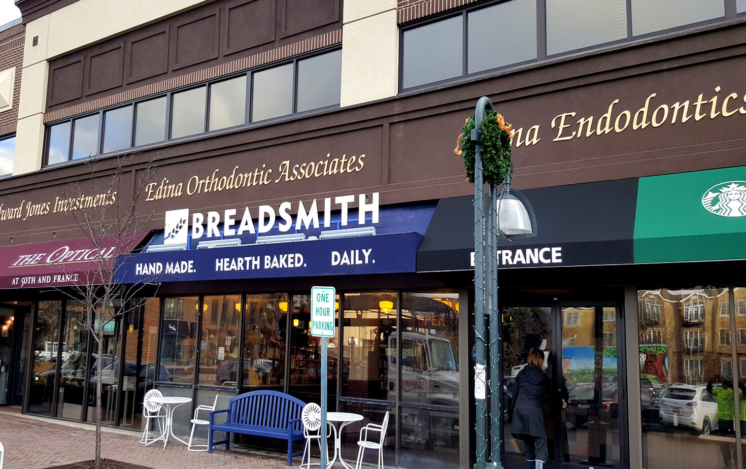 50TH AND FRANCE STOREFRONT PHOTO OF AWNINGS AND BUILDING SIGNAGE