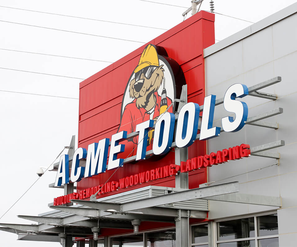 Acme Tools channel letters and logo cabinet on storefront with custom mounting Grand Forks ND