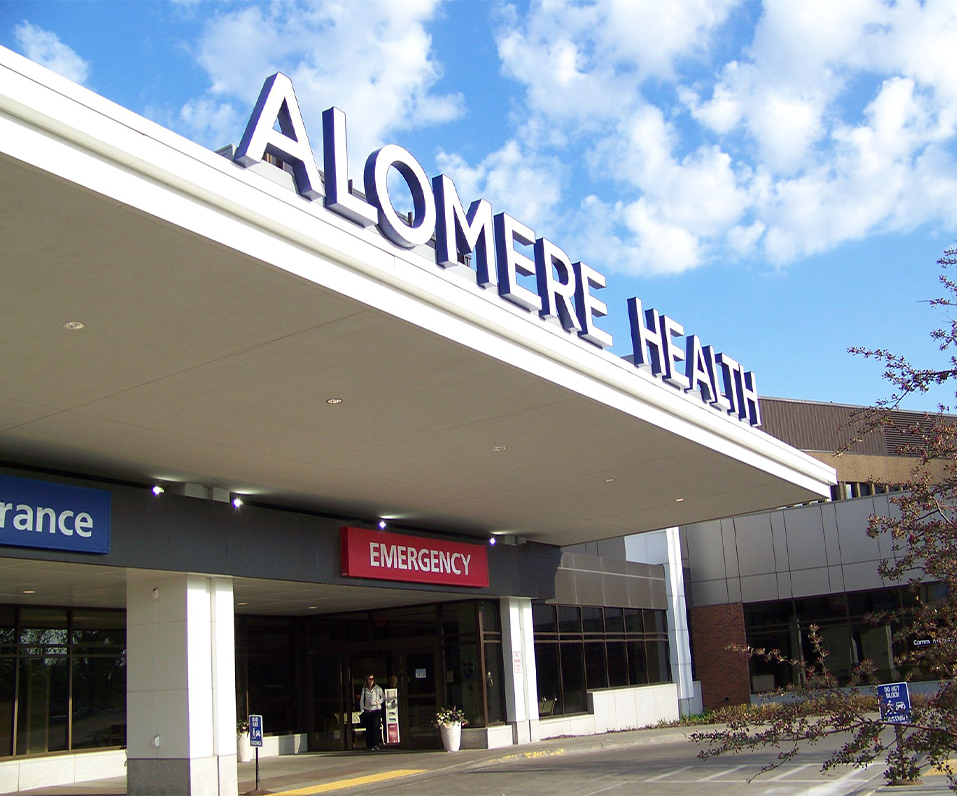 Alomere Health Alexandria MN Channel Letters Mounted on custom raceway above entrance