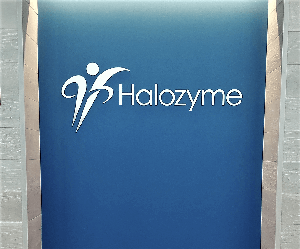 Interior Logo Halozyme on wall externally illuminated