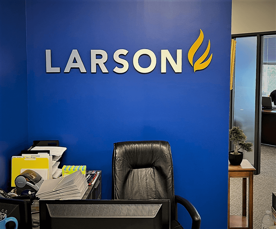 Interior Logo Larson PVC letters on Blue wall