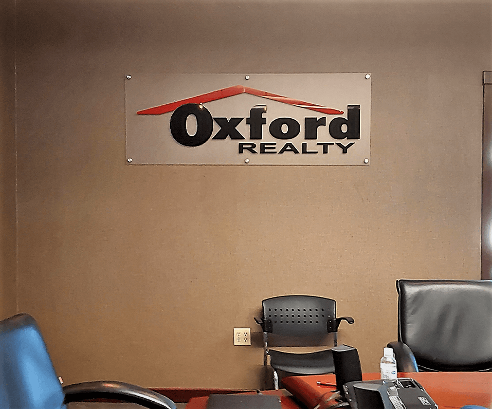 Interior-Logo_Oxford-Realty-Inteior-Sign