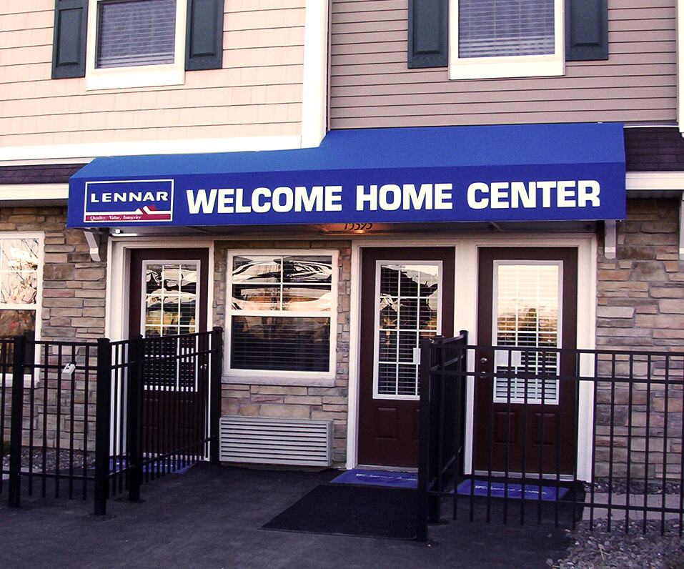Lennar Home Center storefront with Blue illuminated awning over entrance