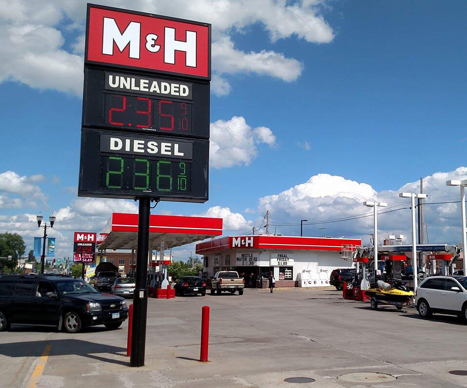 M&H Grand Rapids MN sign with gas pricer digital display
