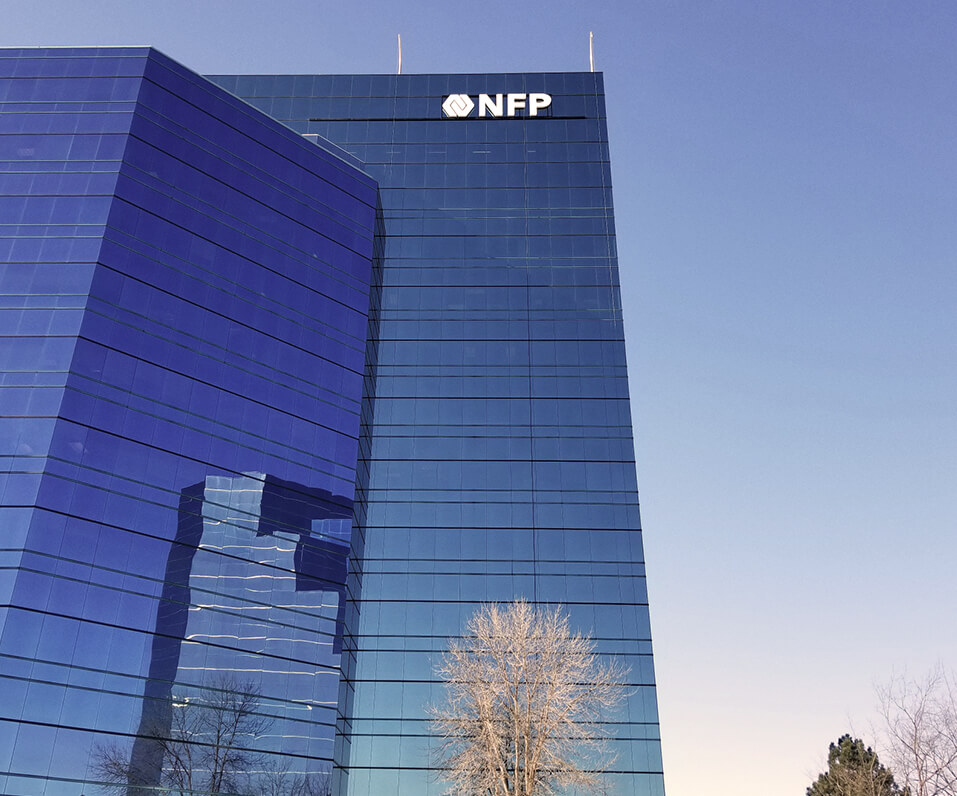 NFP Building Letters on glass high-rise building