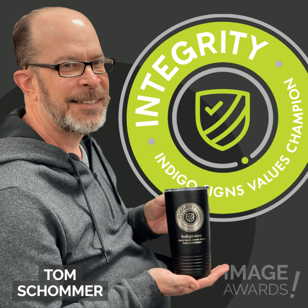 Tom Schommer INTEGRITY IMAGE Awards Winner posing with custom mug