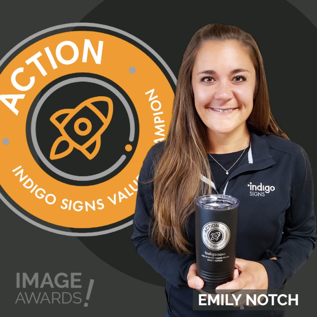 Emily Notch Action IMAGE Awards Winner posing with custom mug